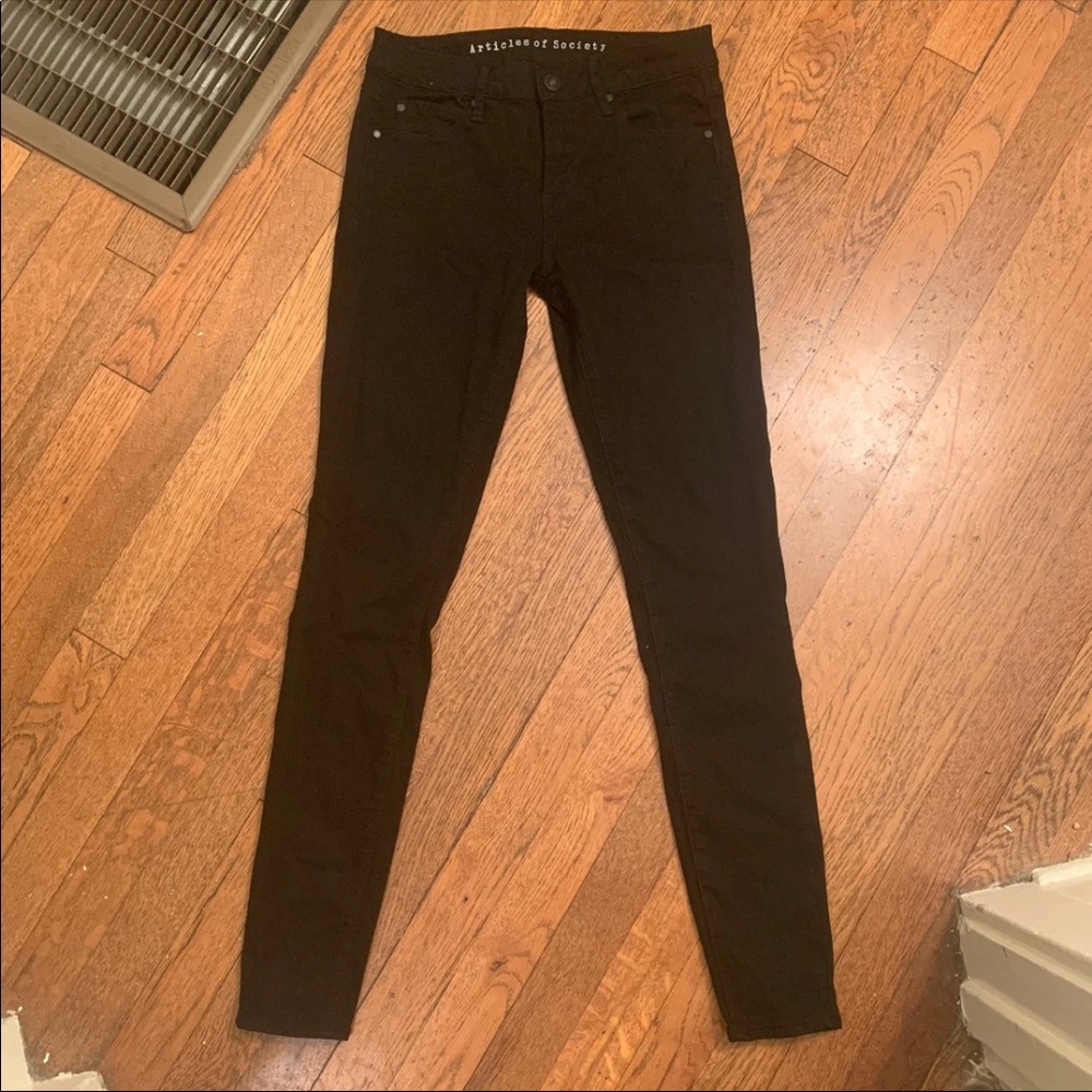 Black articles of society jeans